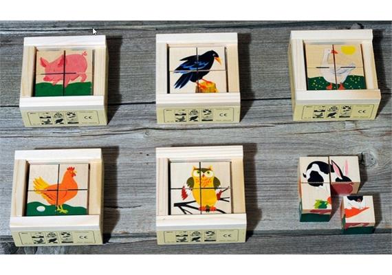 Klötzlipuzzle Mini 4-teilig HaustiereHolzhinterg. Klötzlipuzzle Mini 4-teilig HaustiereHolzhinterg.
