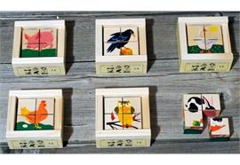 Klötzlipuzzle Mini 4-teilig HaustiereHolzhinterg.